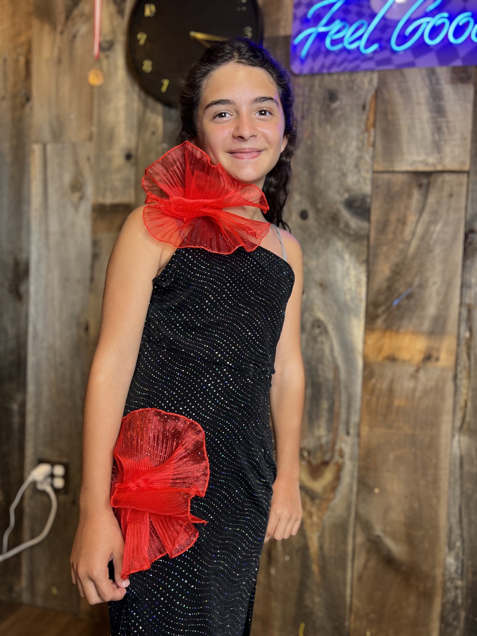 A young designer in her finale look