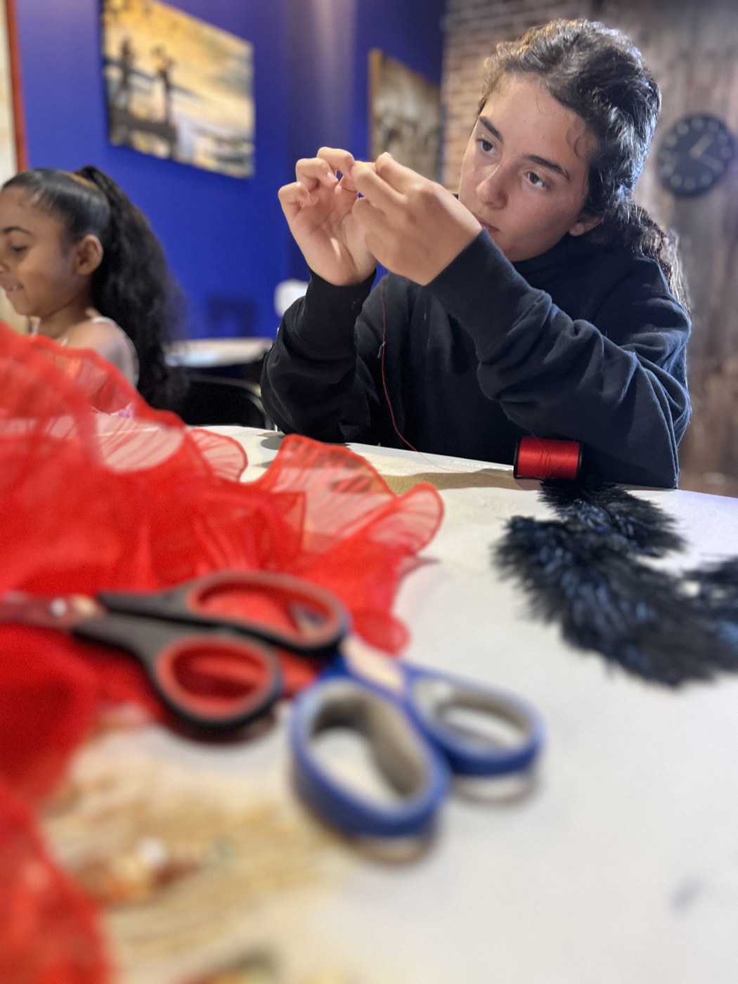 A young designer with the piece she made