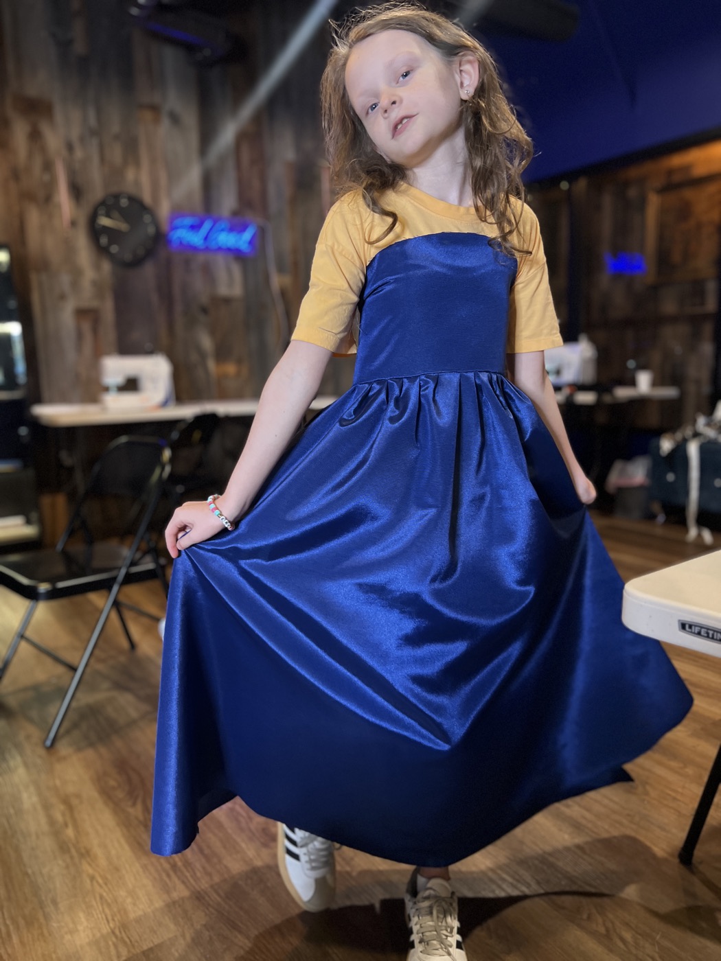 A young designer with her creation